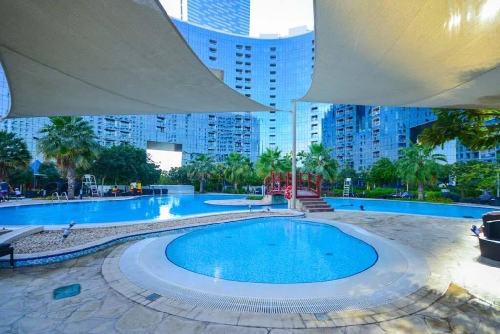 Апартаменты Cozy 1Br In Iconic Tower Абу-Даби Экстерьер фото